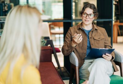 A psychiatrist in discussion with her patient