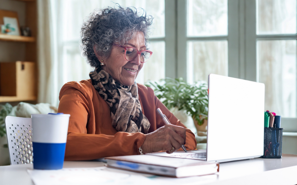 woman uses laptop to join webinar