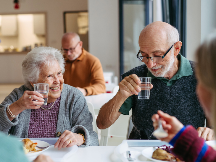 older adults enjoying a meal