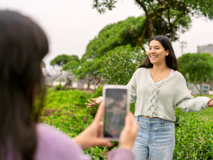 teens create video in a park